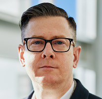 Alexander Hughes, PDG à la tête d'une société de cryptomonnaies, portrait